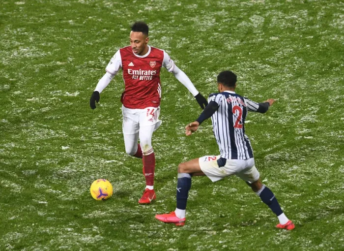 Framed Print : Arsenal's Aubameyang Faces Off Against West Brom's Furlong in Premier League Clash