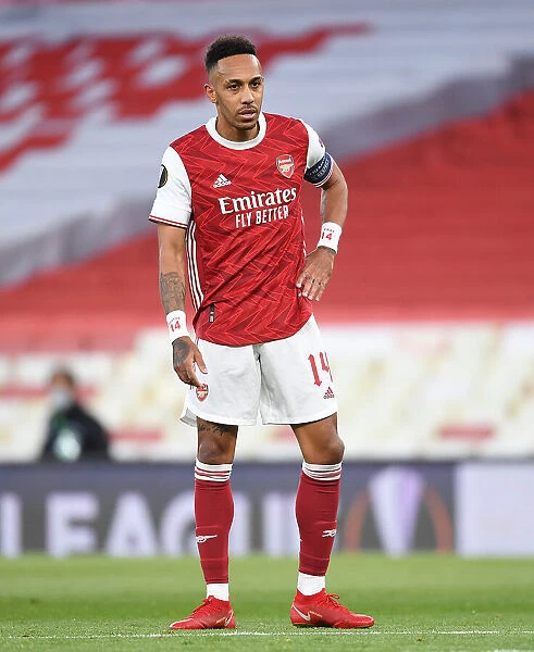Arsenal's Aubameyang Fights for Europa League Victory Amidst Emirates Stadium's Empty Seats: 2020-21 Semi-Final Showdown during Pandemic Restrictions