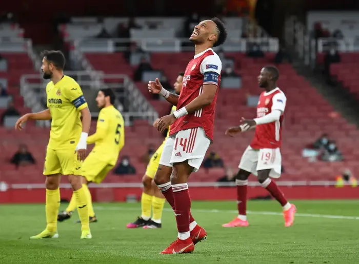 Framed Print : Arsenal's Aubameyang Fights for Europa League Victory Alone at Emptied Emirates Amidst Pandemic