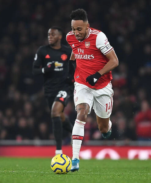 Arsenal's Aubameyang Goes Head-to-Head with Manchester United in Premier League Clash