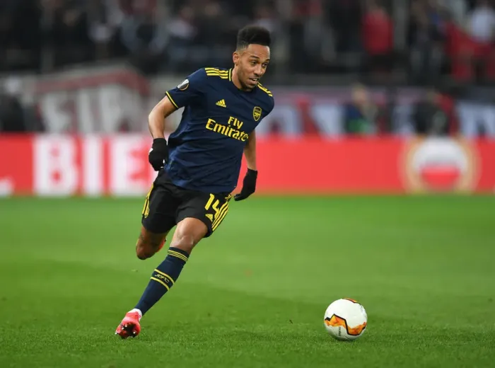 Framed Print : Arsenal's Aubameyang Goes Head-to-Head with Olympiacos in Europa League Showdown