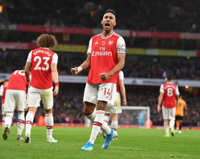 Framed Print : Arsenal's Aubameyang Goes Head-to-Head with Wolverhampton in Premier League Showdown Framed Print : Arsenal's Aubameyang Goes Head-to-Head with Wolverhampton in Premier League Showdown