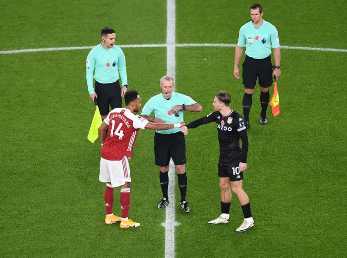 Framed Print : Arsenal's Aubameyang and Grealish Share a Moment Before Arsenal vs. Aston Villa (2020-21) Framed Print : Arsenal's Aubameyang and Grealish Share a Moment Before Arsenal vs. Aston Villa (2020-21)