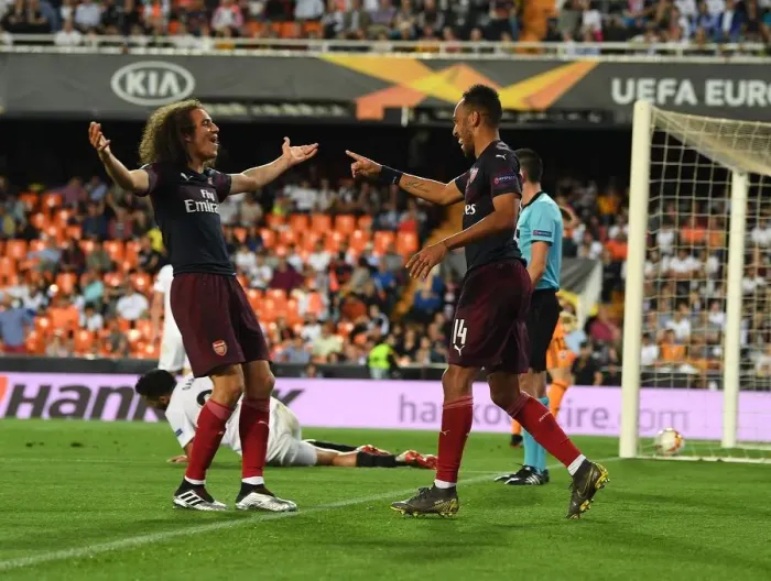 Framed Print : Arsenal's Aubameyang and Guendouzi Celebrate Goals in Europa League Semi-Final vs Valencia