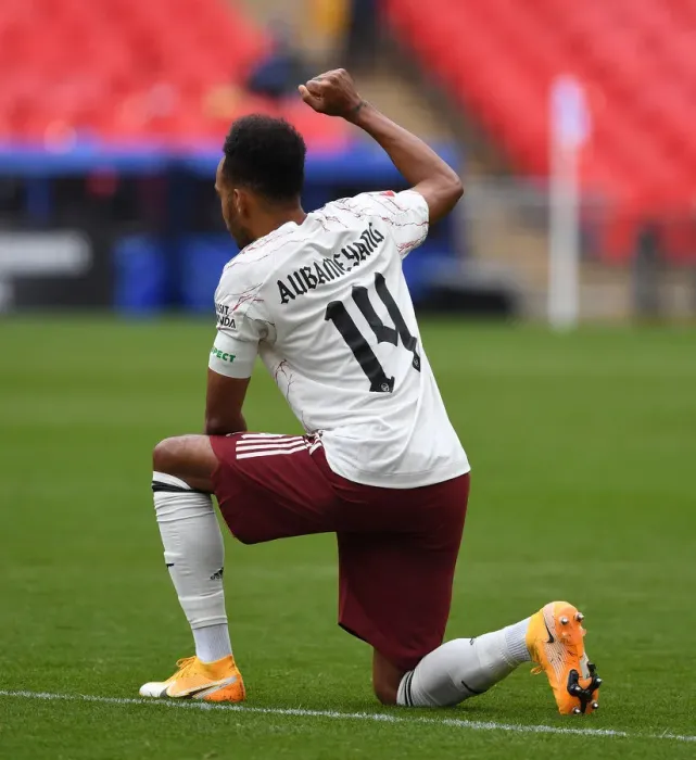 Framed Print : Arsenal's Aubameyang Kneels Before FA Community Shield Match Against Liverpool Framed Print : Arsenal's Aubameyang Kneels Before FA Community Shield Match Against Liverpool