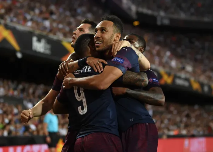Framed Print : Arsenal's Aubameyang, Lacazette, and Xhaka Celebrate Goal in Europa League Semi-Final vs Valencia Framed Print : Arsenal's Aubameyang, Lacazette, and Xhaka Celebrate Goal in Europa League Semi-Final vs Valencia