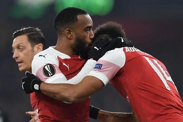 Arsenal's Aubameyang and Lacazette Celebrate Goal in Europa League Clash