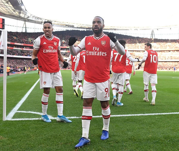 Arsenal's Aubameyang and Lacazette: Celebrating Glory Against Chelsea in a Thrilling Premier League Clash