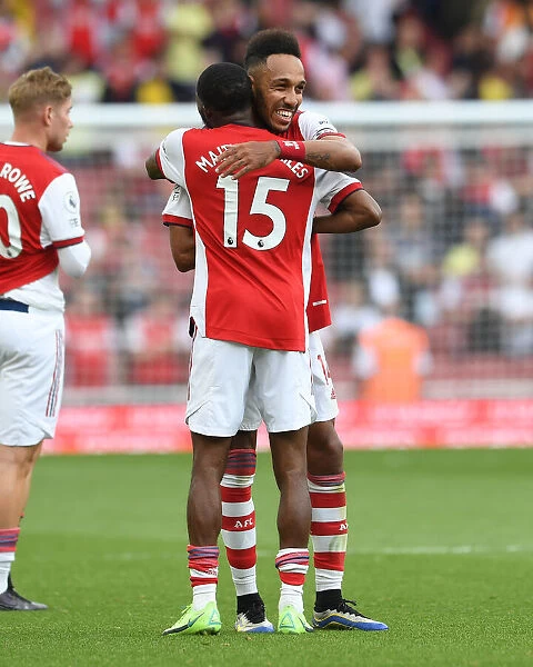 Arsenal's Aubameyang and Maitland-Niles: Victory Celebration Against Norwich City