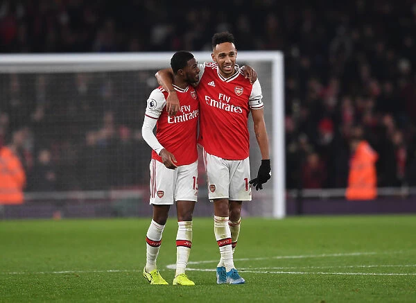 Arsenal's Aubameyang and Maitland-Niles Celebrate Victory Over Manchester United (2019-20)