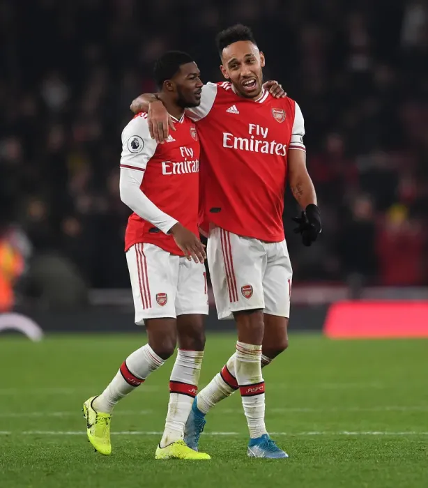 Framed Print : Arsenal's Aubameyang and Maitland-Niles Celebrate Victory Over Manchester United (2019-20) Framed Print : Arsenal's Aubameyang and Maitland-Niles Celebrate Victory Over Manchester United (2019-20)
