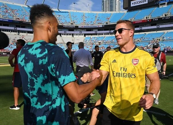 Arsenal's Aubameyang Mingles with NFL Star McCaffrey Ahead of Charlotte Clash (2019)