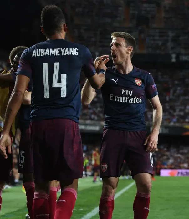 Framed Print : Arsenal's Aubameyang and Monreal Celebrate Goal in Europa League Semi-Final vs Valencia Framed Print : Arsenal's Aubameyang and Monreal Celebrate Goal in Europa League Semi-Final vs Valencia