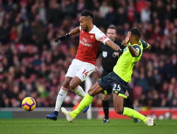 Framed Print : Arsenal's Aubameyang Outmaneuvers Huddersfield's Jorgensen