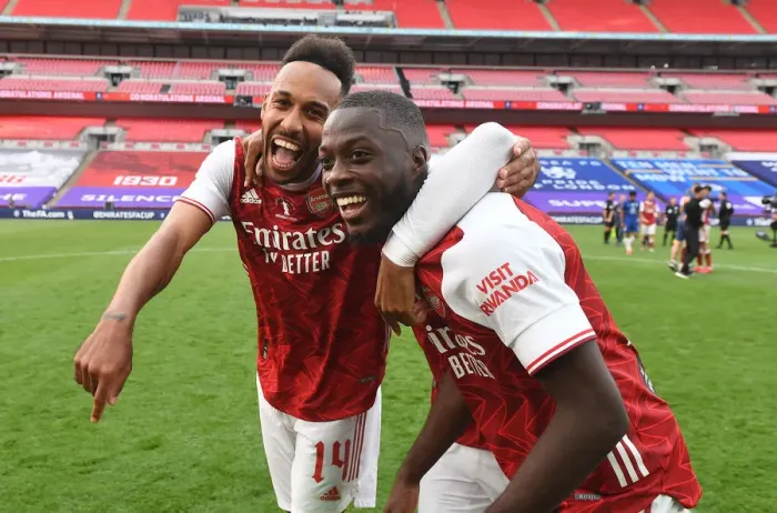 Framed Print : Arsenal's Aubameyang and Pepe Celebrate FA Cup Victory Over Chelsea in Empty Wembley