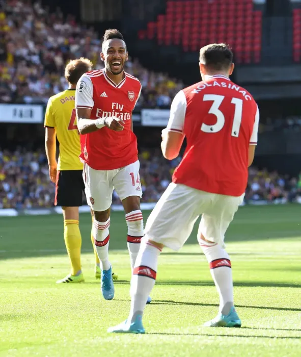 Framed Print : Arsenal's Aubameyang Scores Brace: Arsenal Secures Victory Against Watford in 2019-20 Premier League Framed Print : Arsenal's Aubameyang Scores Brace: Arsenal Secures Victory Against Watford in 2019-20 Premier League