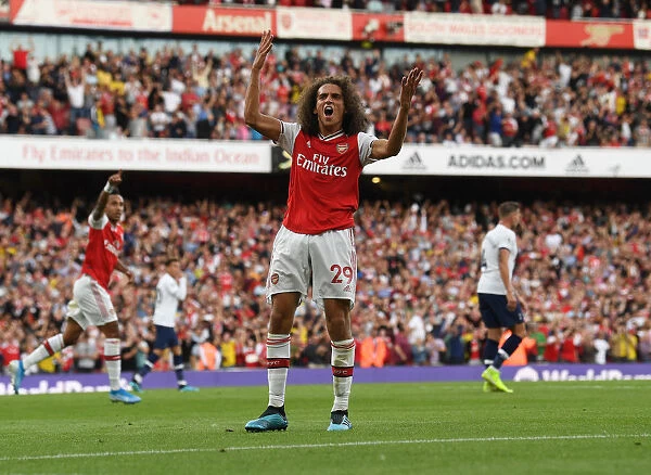 Arsenal's Aubameyang Scores Brace Against Tottenham: Guendouzi's Exuberant Celebration (2019-20 Premier League)