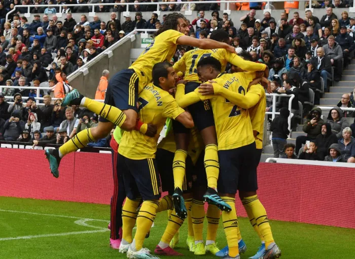 Framed Print : Arsenal's Aubameyang Scores in Newcastle Victory: Guendouzi and Mkhitaryan Celebrate Framed Print : Arsenal's Aubameyang Scores in Newcastle Victory: Guendouzi and Mkhitaryan Celebrate