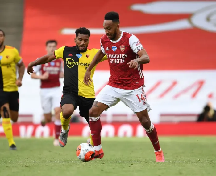 Framed Print : Arsenal's Aubameyang Scores Past Mariappa in Arsenal vs. Watford (2019-20)