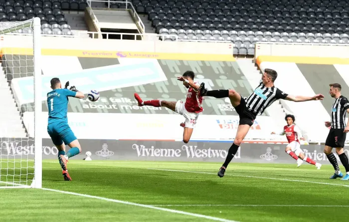 Framed Print : Arsenal's Aubameyang Scores in Empty St. James Park: Arsenal Triumph Over Newcastle in the 2021-22 Premier League