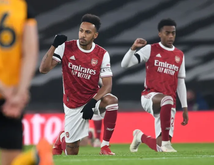 Framed Print : Arsenal's Aubameyang Takes a Knee in Empty Emirates Stadium vs. Wolverhampton Wanderers (2020-21) Framed Print : Arsenal's Aubameyang Takes a Knee in Empty Emirates Stadium vs. Wolverhampton Wanderers (2020-21)