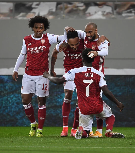 Arsenal's Aubameyang, Willian, Saka, and Lacazette Celebrate Goals Against SL Benfica in Europa League