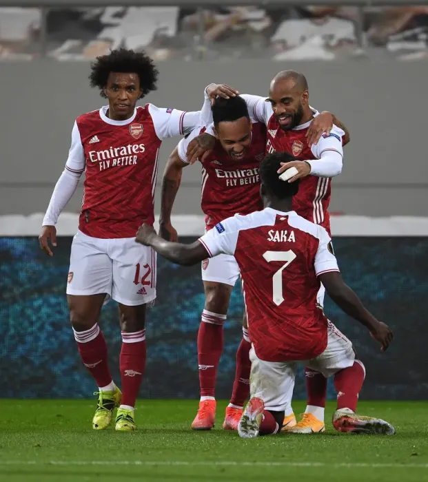 Framed Print : Arsenal's Aubameyang, Willian, Saka, and Lacazette Celebrate Goals Against SL Benfica in Europa League