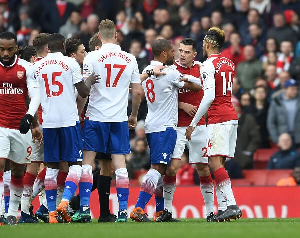 Arsenal's Aubameyang and Xhaka in Intense Clash with Stoke City's Glen Johnson