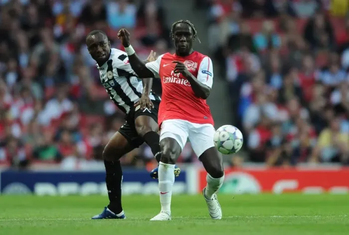 Framed Print : Arsenal's Bacary Sagna Tackles Udinese's Pablo Armero in 2011-12 UEFA Champions League Play-Off Framed Print : Arsenal's Bacary Sagna Tackles Udinese's Pablo Armero in 2011-12 UEFA Champions League Play-Off
