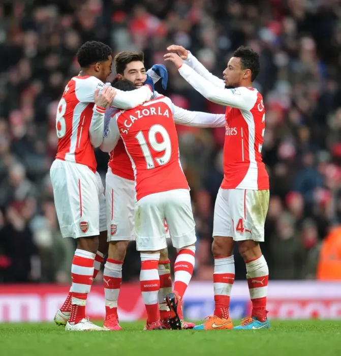 Framed Print : Arsenal's Bellerin, Akpom, Cazorla, and Coquelin Celebrate Goal Against Aston Villa (2014-15)