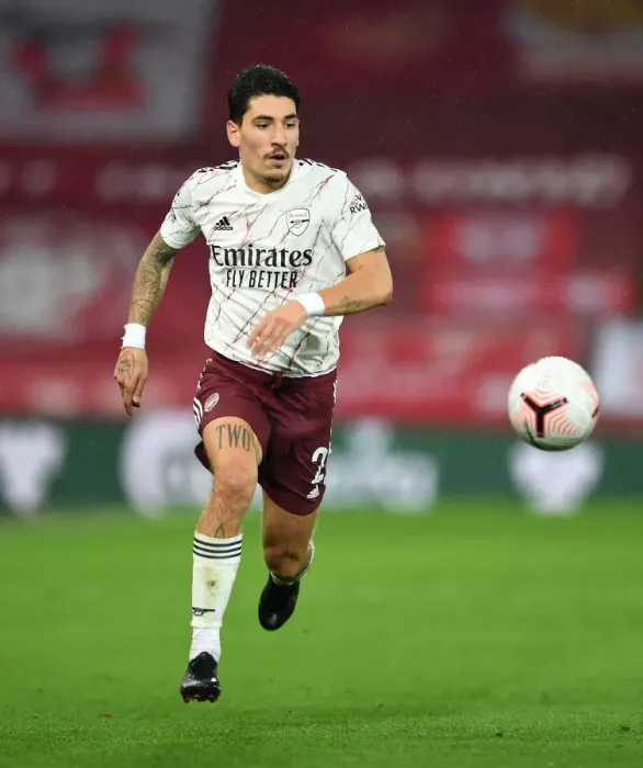 Framed Print : Arsenal's Bellerin at Anfield: 2020-21 Premier League Clash Amidst Empty Stands