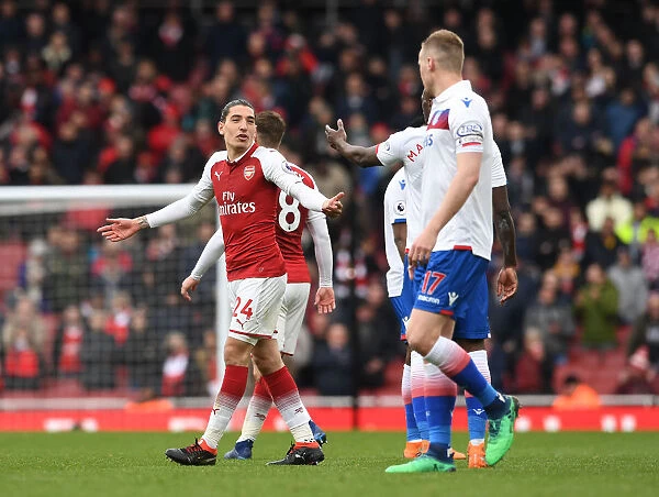 Arsenal's Bellerin Engages in Conversation with Stoke's Shawcross during Premier League Clash