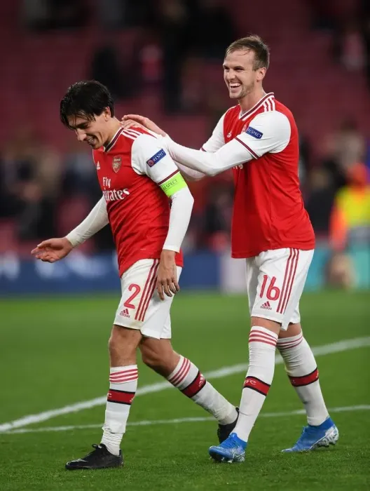 Framed Print : Arsenal's Bellerin and Holding Celebrate Europa League Victory Over Standard Liege Framed Print : Arsenal's Bellerin and Holding Celebrate Europa League Victory Over Standard Liege