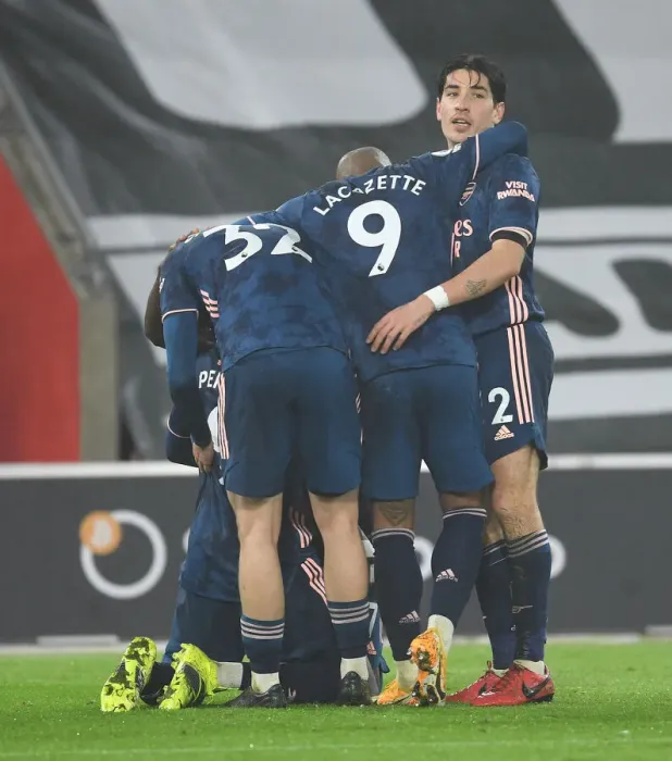 Framed Print : Arsenal's Bellerin, Lacazette, and Smith Rowe Celebrate 2nd Goal Against Southampton in Empty St. Mary's Stadium (2020-21)