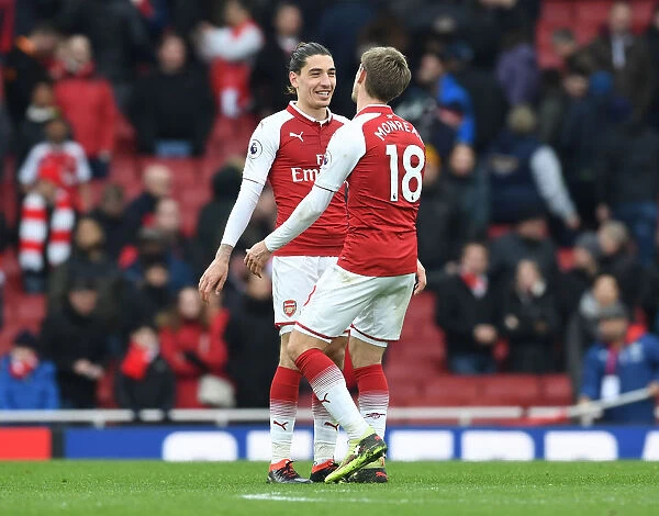 Arsenal's Bellerin and Monreal Celebrate Victory Over Stoke City