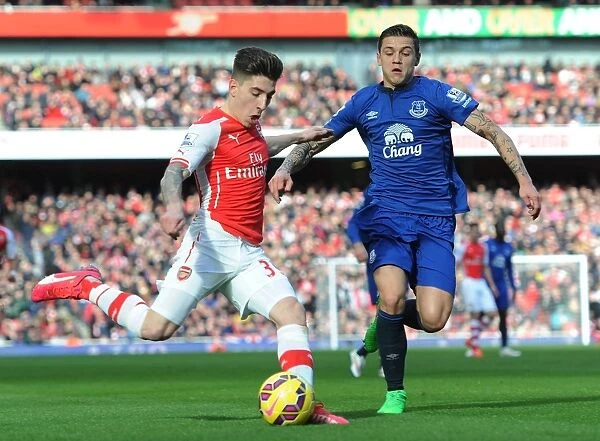 Arsenal's Bellerin Outmaneuvers Everton's Besic in Premier League Clash