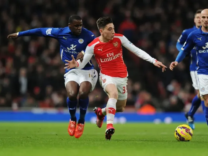 Framed Print : Arsenal's Bellerin Outruns Leicester's Schlupp in Premier League Clash Framed Print : Arsenal's Bellerin Outruns Leicester's Schlupp in Premier League Clash