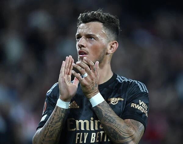 Arsenal's Ben White Applauding Fans after PSV Eindhoven Victory in Europa League