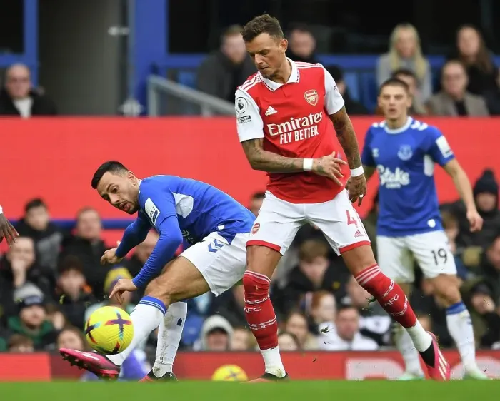 Framed Print : Arsenal's Ben White Clashes with Everton's Dwight McNeil in Premier League Showdown Framed Print : Arsenal's Ben White Clashes with Everton's Dwight McNeil in Premier League Showdown