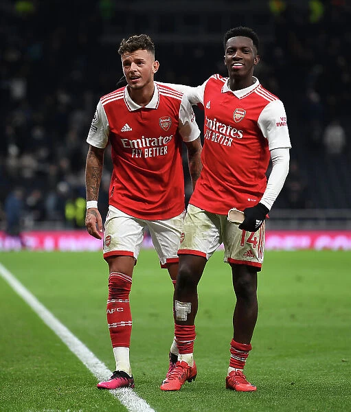 Arsenal's Ben White and Eddie Nketiah Celebrate Victory Over Tottenham Hotspur in 2022-23 Premier League Clash