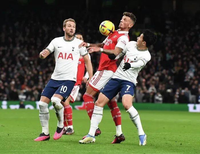 Framed Print : Arsenal's Ben White Faces Off Against Tottenham's Harry Kane and Son Heung-Min in Premier League Clash