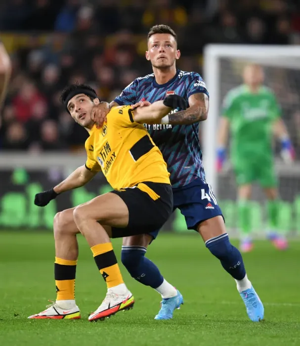 Framed Print : Arsenal's Ben White Fends Off Raul Jimenez in Intense Wolverhampton Wanderers Clash (Premier League 2021-22)