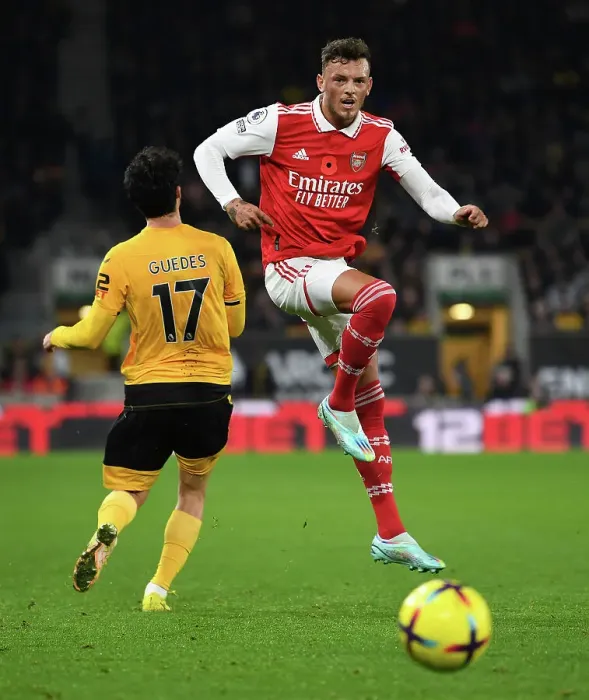 Framed Print : Arsenal's Ben White Fends Off Wolves Goncalo Guedes Pressure in Premier League Clash (Wolverhampton Wanderers vs Arsenal 2022-23)