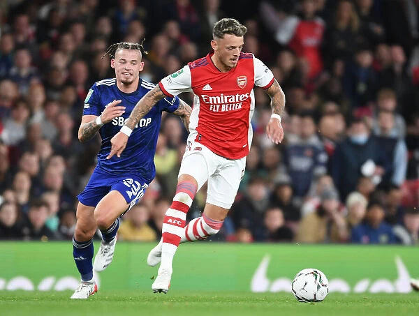 Arsenal's Ben White Outmaneuvers Leeds Kalvin Phillips in Carabao Cup Showdown