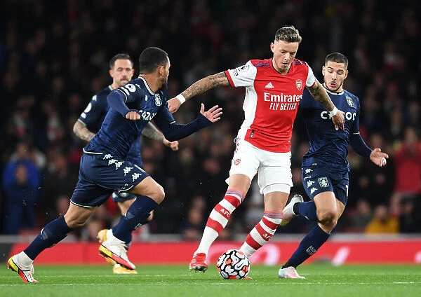 Arsenal's Ben White Outwits Douglas Luiz: A Premier League Battle at Emirates Stadium