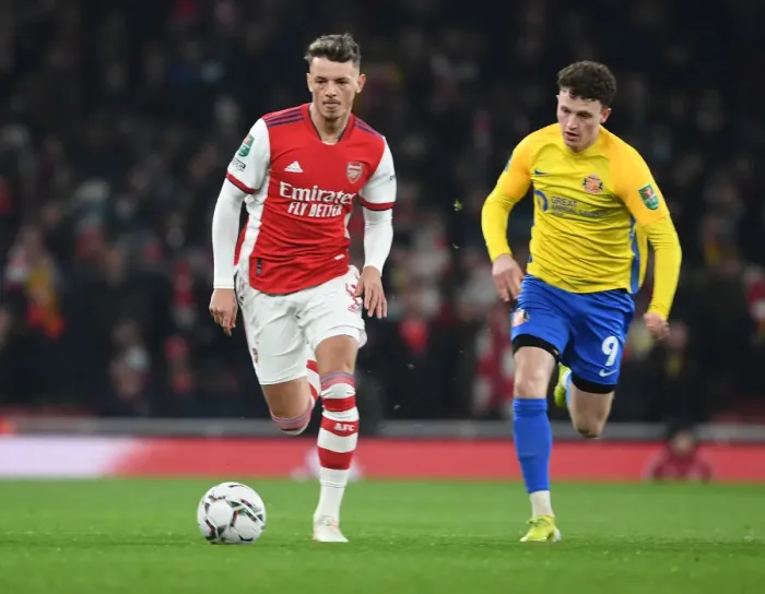 Framed Print : Arsenal's Ben White Overpowers Sunderland's Nathan Broadhead in Carabao Cup Quarterfinal Showdown Framed Print : Arsenal's Ben White Overpowers Sunderland's Nathan Broadhead in Carabao Cup Quarterfinal Showdown