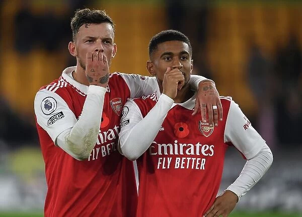 Arsenal's Ben White and Reiss Nelson Celebrate Victory over Wolverhampton Wanderers in 2022-23 Premier League