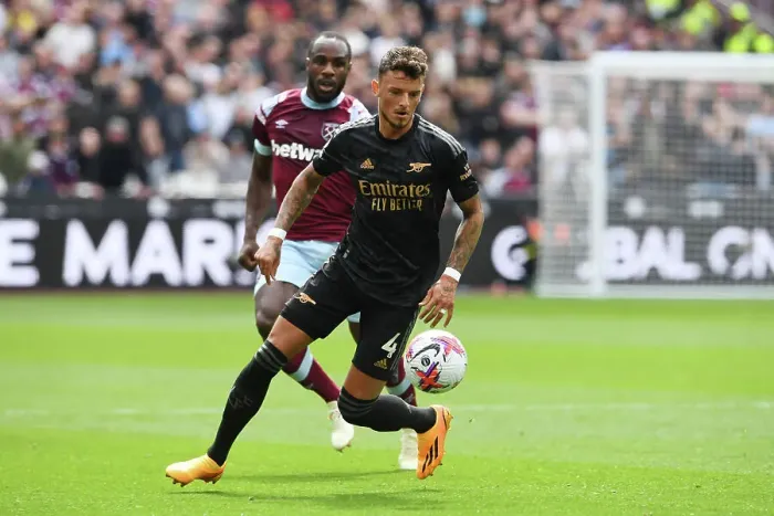 Framed Print : Arsenal's Ben White Sprints Past West Ham Defenders in Premier League Clash