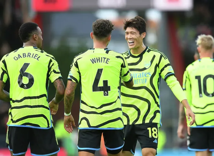 Framed Print : Arsenal's Ben White and Takehiro Tomiyasu Celebrate Fourth Goal Against AFC Bournemouth (2023-24)
