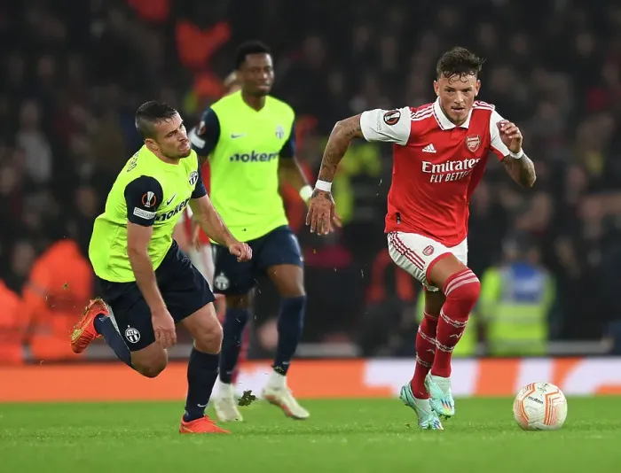 Framed Print : Arsenal's Ben White vs. Adrian Guerrero: A Europa League Showdown in North London